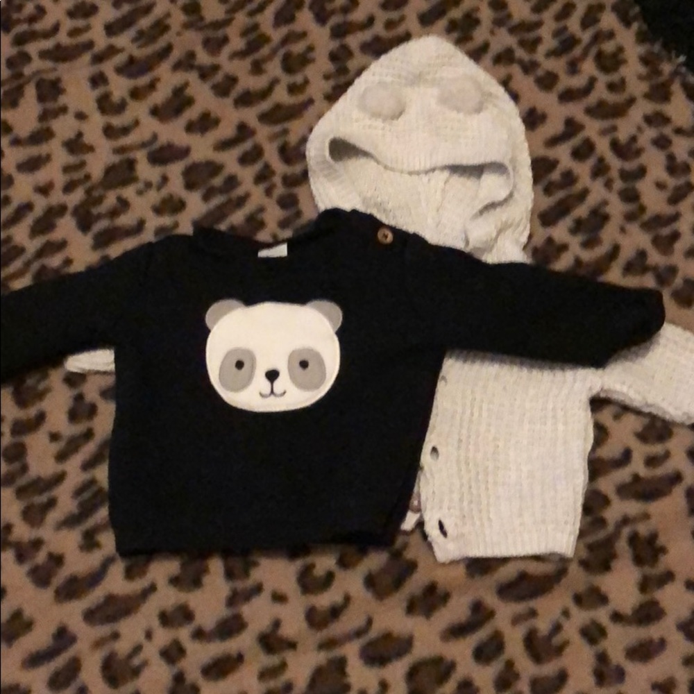 A Newborn fleece top and a sweater.